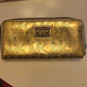 Rare MICHAEL KORS zipped wallet, gold color with monogram